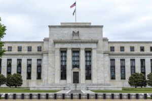 Inflation Dilemma: Fed Official Warns of Possible Rate Hikes Amidst Market Expectations for Cuts