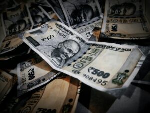 a stack of assorted indian rupees