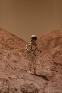 astronaut standing on dry ground