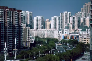 high rise apartment buildings in bustling cityscape