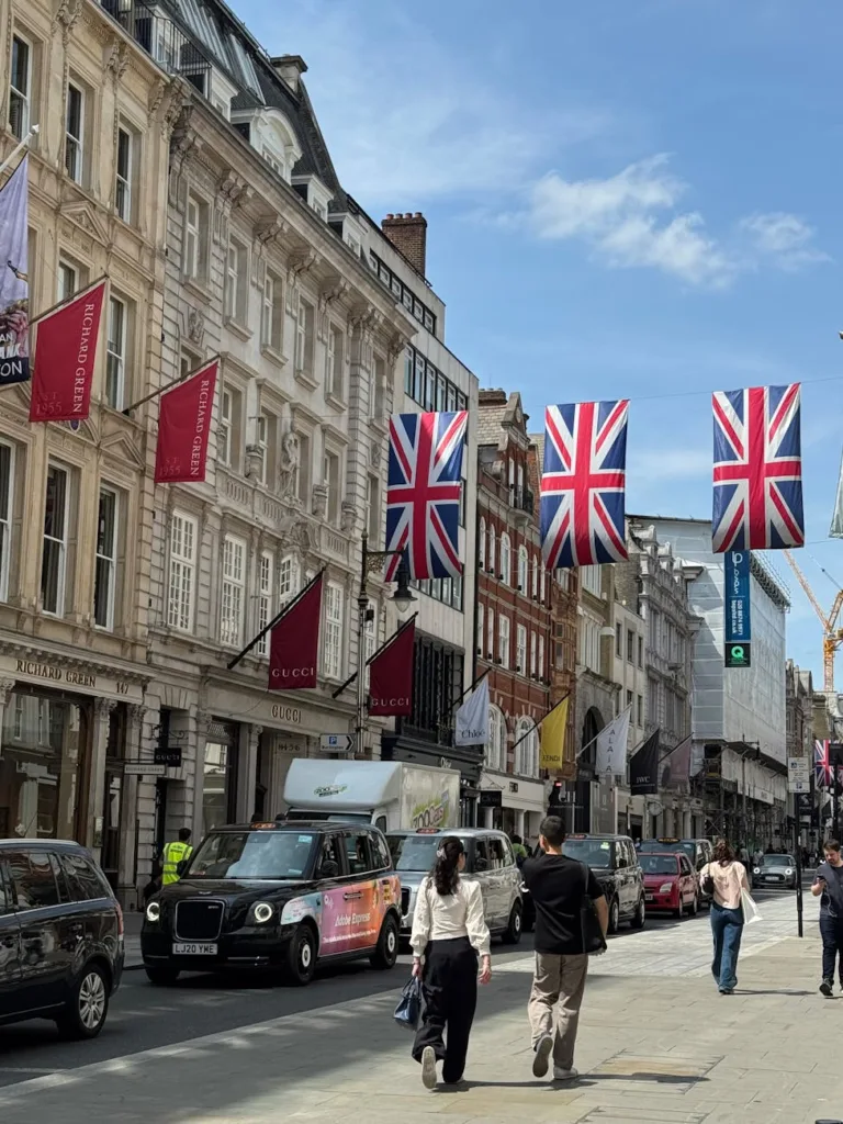 bustling street scene with union jacks in london