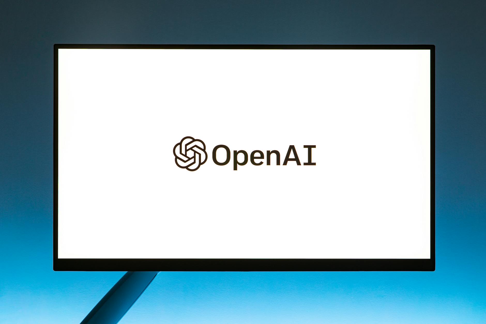 OpenAI and AMD Announce Multibillion-Dollar AI Data Center Partnership 1 Your Pulse on Stocks, Finance, Markets & the Global Economy computer monitor with openai website loading screen