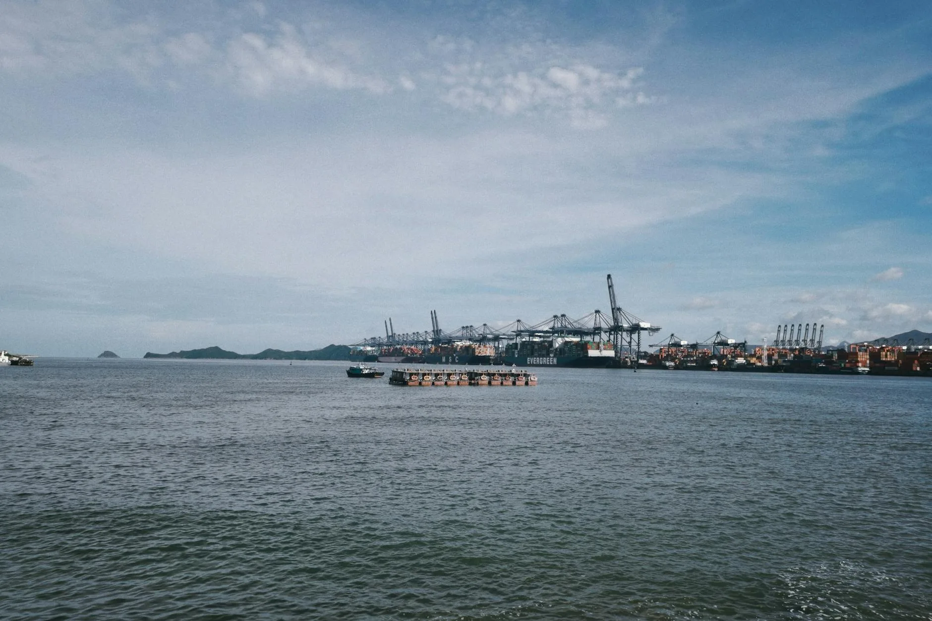 scenic port view with cranes and water