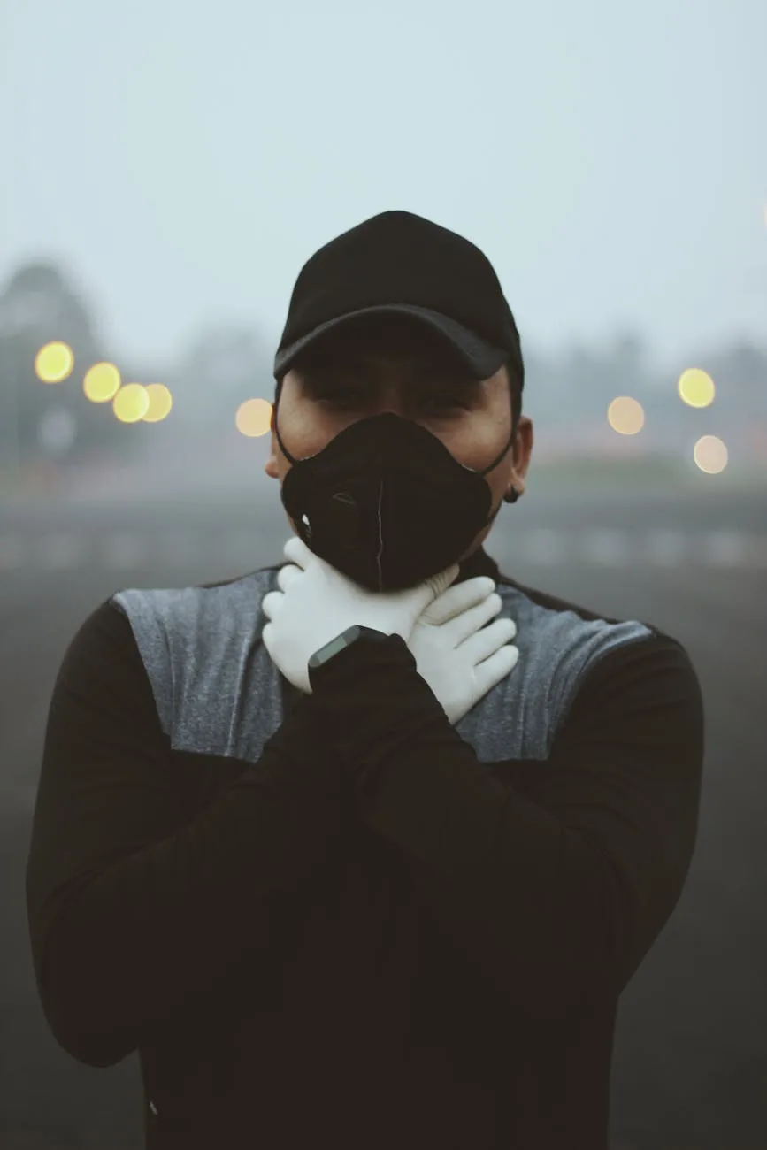 Delhi Pollution Turns Deadly: 75% Households Report Illness, Survey Reveals 1 Your Pulse on Stocks, Finance, Markets & the Global Economy man in black respirator and black cap holding hands in white gloves near neck
