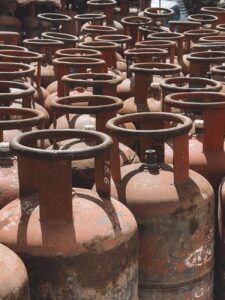 India Government Raises LPG Supply to Support Food Sector and Migrant Workers 12 Your Pulse on Stocks, Finance, Markets & the Global Economy rows of rusty gas cylinders in nepal