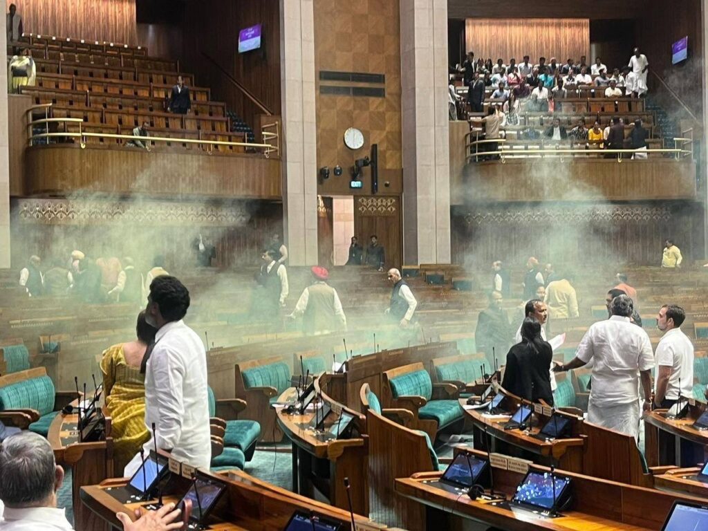 Security Breach Unfolds in Lok Sabha: Disruption and Evacuation Amidst 22nd Anniversary of Parliament Attack