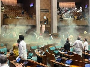 Security Breach Unfolds in Lok Sabha: Disruption and Evacuation Amidst 22nd Anniversary of Parliament Attack